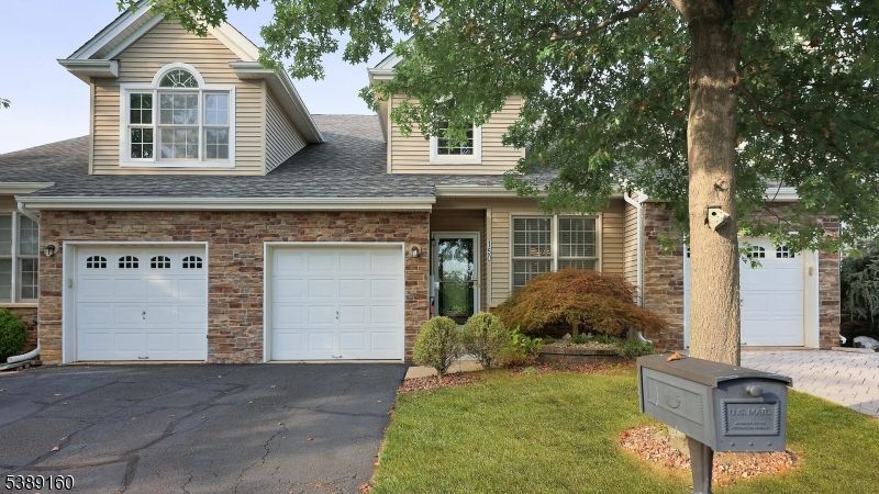Attached, Exterior, Facade, Brick Facade, American Craftsman