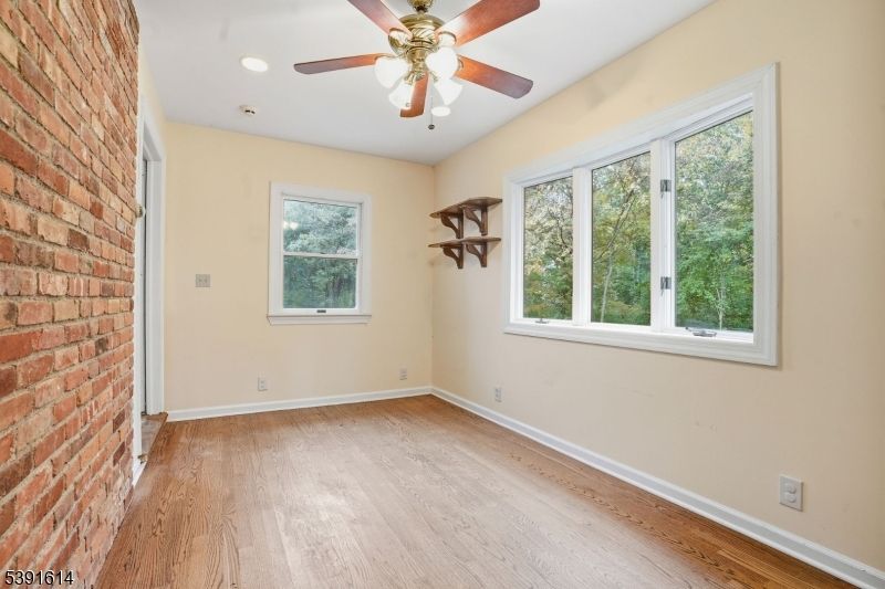 Empty room, Interior, Recessed Lighting, Stone Walls, Wood Texture Flooring