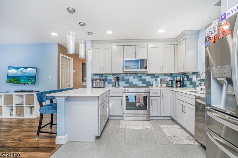 Interior, Kitchen, Pendant Lights, Recessed Lighting, Stainless Steel Appliances, Wood Texture Flooring