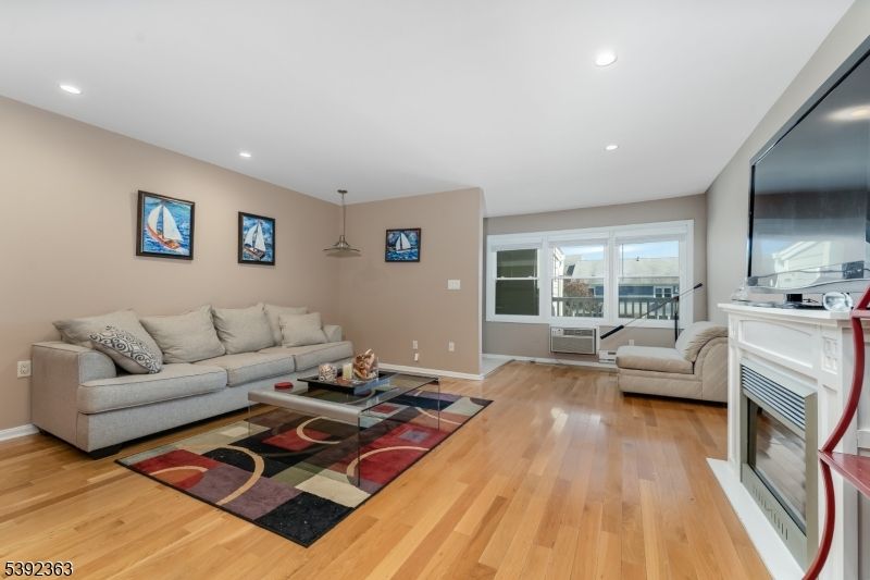 Fireplace, Interior, Living room, Pendant Lights, Recessed Lighting, Wood Texture Flooring