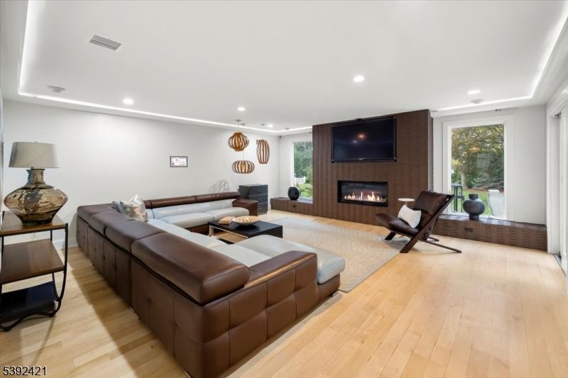 Fireplace, Interior, Living room, Recessed Lighting, Wood Texture Flooring