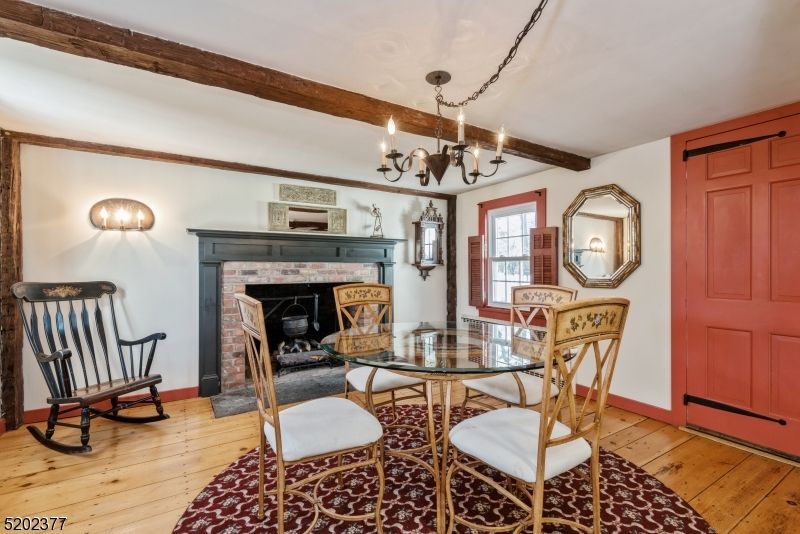 Chandelier, Dining room, Fireplace, Interior, Wooden Beams, Wood Texture Flooring