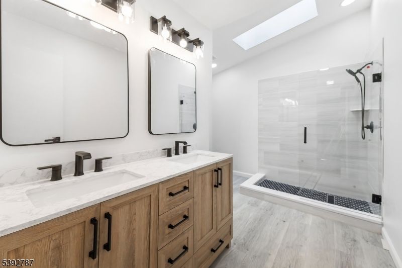 Bathroom, Dual Sink Vanities, Glass Shower, Interior, Wood Texture Flooring