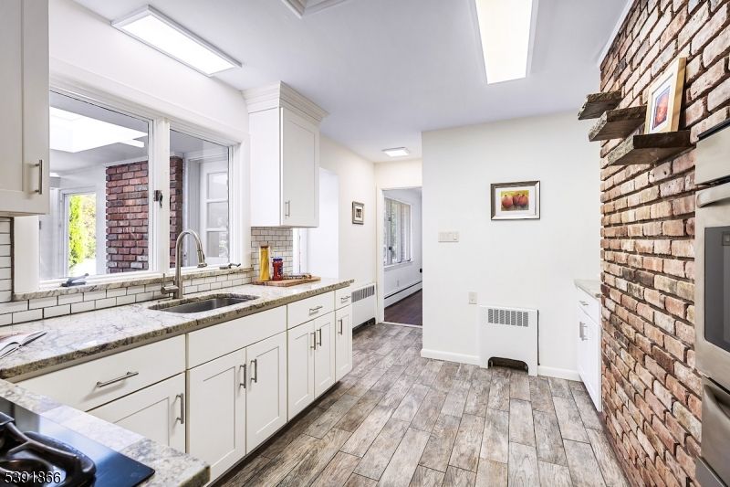 Interior, Kitchen, Recessed Lighting, Stone Walls, Wood Texture Flooring