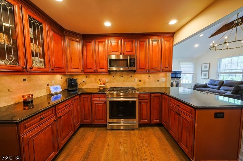 Chandelier, Interior, Kitchen, Recessed Lighting, Stainless Steel Appliances, Wood Texture Flooring