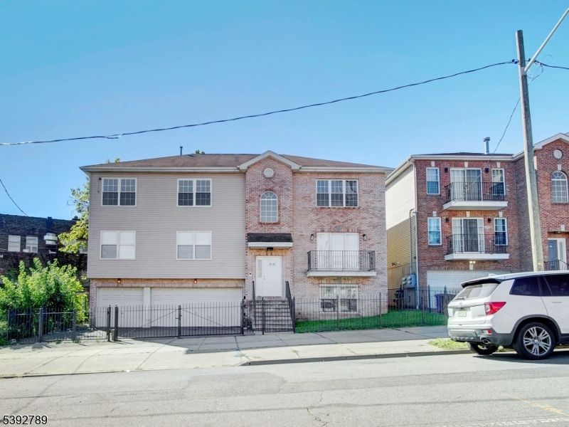 Attached, Exterior, Facade, Brick Facade, Rowhouse