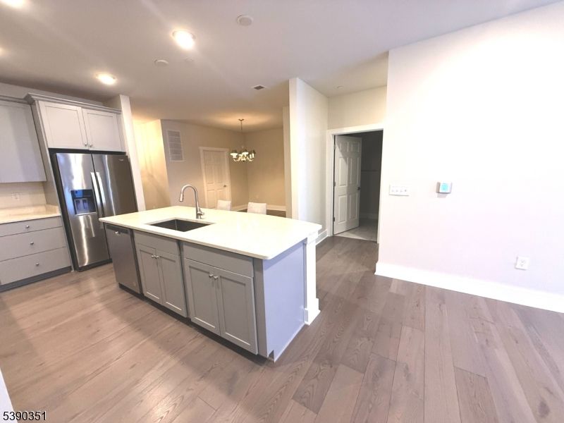 Chandelier, Interior, Kitchen, Recessed Lighting, Stainless Steel Appliances, Wood Texture Flooring