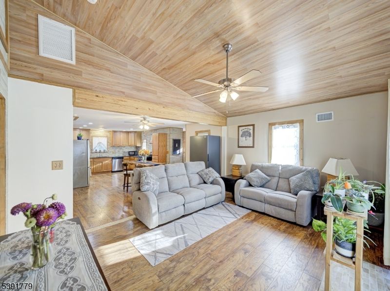 Interior, Kitchen, Living room, Recessed Lighting, Stainless Steel Appliances, Wooden Ceilings, Wood Texture Flooring, Wooden Walls