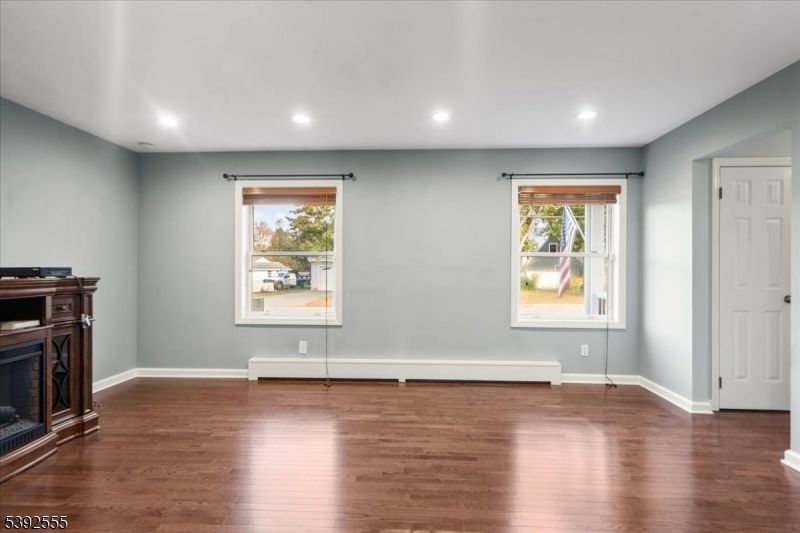 Empty room, Fireplace, Interior, Recessed Lighting, Wood Texture Flooring