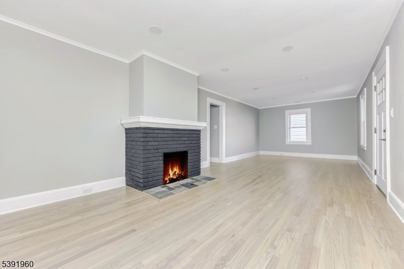 Empty room, Fireplace, Interior, Recessed Lighting, Wood Texture Flooring