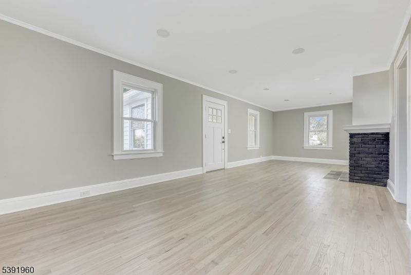 Empty room, Fireplace, Interior, Recessed Lighting, Wood Texture Flooring