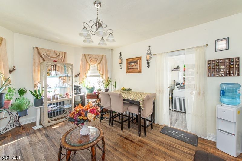 Chandelier, Dining room, Interior, Wood Texture Flooring