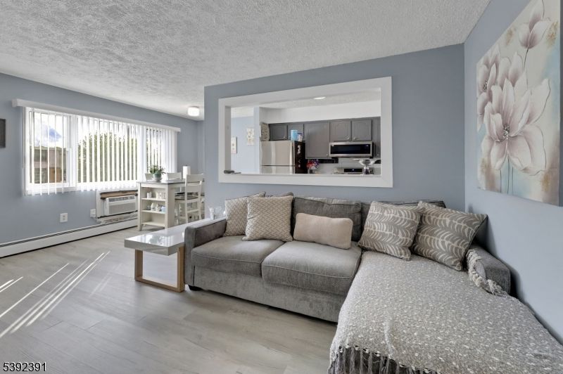 Dining room, Interior, Kitchen, Living room, Stainless Steel Appliances, Wood Texture Flooring