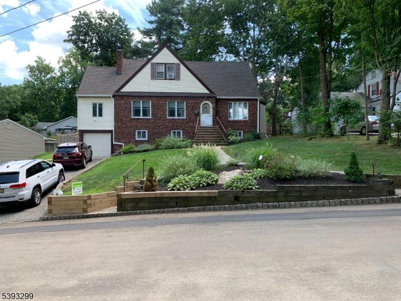 Attached, Exterior, Facade, Brick Facade, Cape Cod