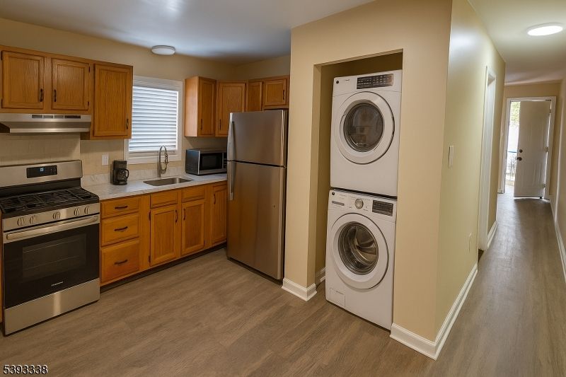 Interior, Kitchen, Recessed Lighting, Utility Closets, Washer, Wood Texture Flooring