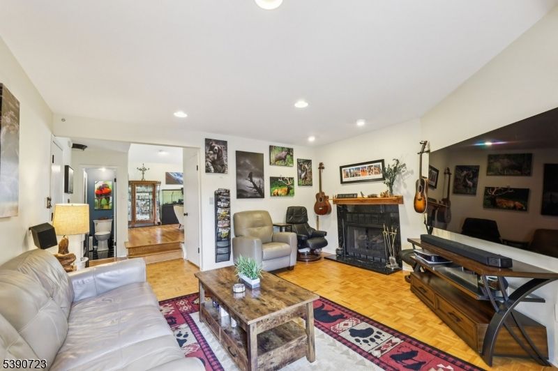 Fireplace, Interior, Living room, Recessed Lighting, Wood Texture Flooring
