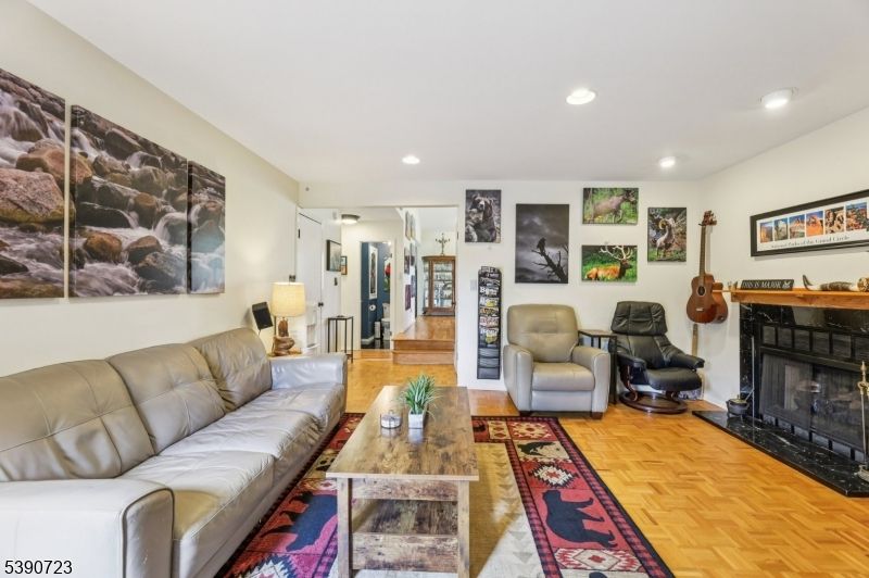 Fireplace, Interior, Living room, Recessed Lighting, Wood Texture Flooring
