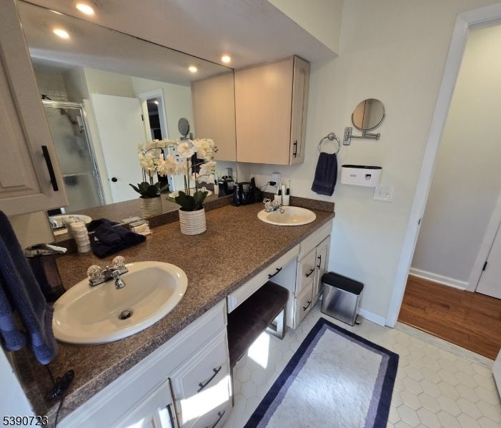 Bathroom, Dual Sink Vanities, Interior, Recessed Lighting, Wood Texture Flooring