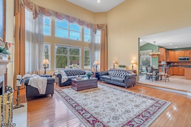 Chandelier, Dining room, Fireplace, Interior, Living room, Recessed Lighting, Wood Texture Flooring