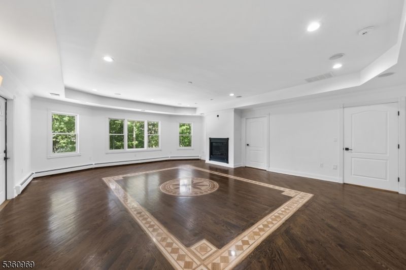 Empty room, Fireplace, Interior, Recessed Lighting, Wood Texture Flooring