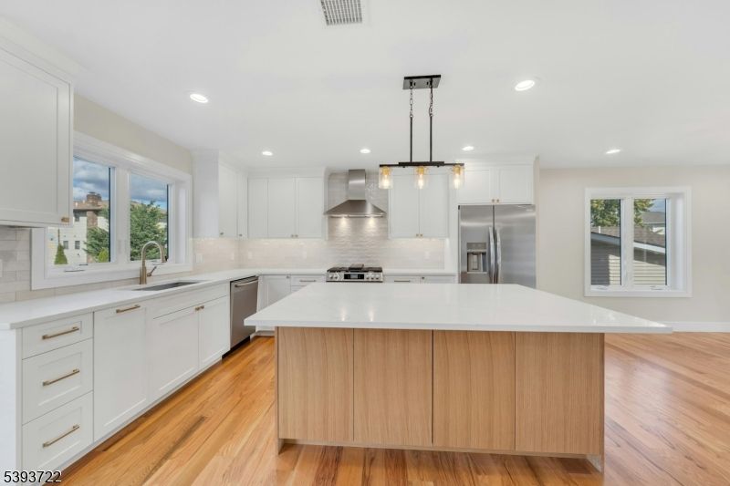 Interior, Kitchen, Pendant Lights, Recessed Lighting, Stainless Steel Appliances, Wood Texture Flooring