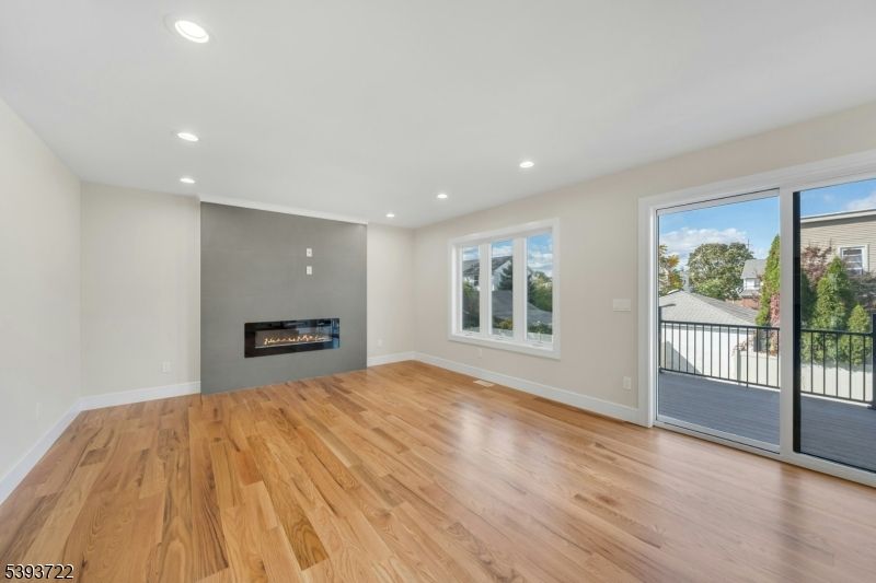 Empty room, Fireplace, Interior, Recessed Lighting, Wood Texture Flooring