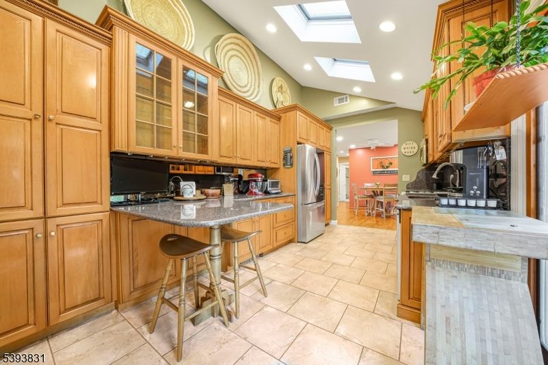 Dining room, Interior, Kitchen, Recessed Lighting, Stainless Steel Appliances, Wood Texture Flooring