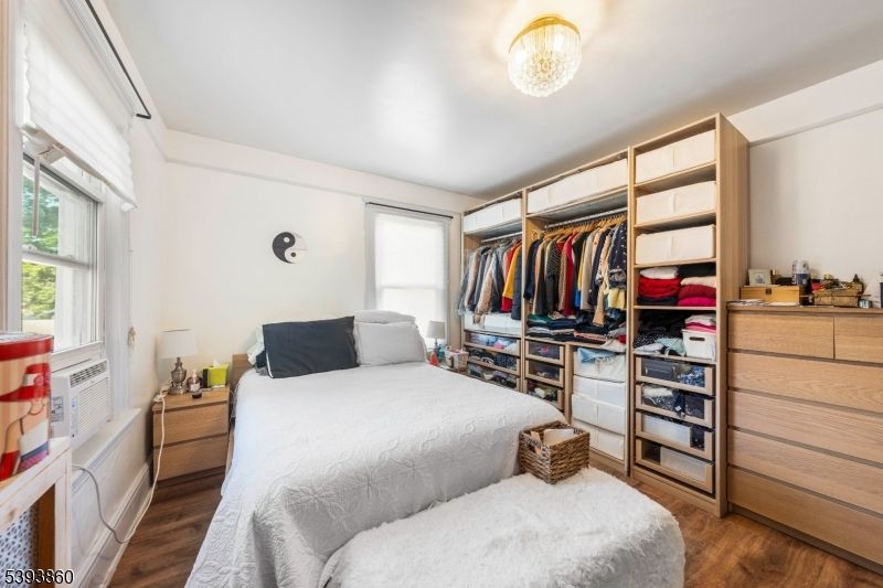 Bedroom, Chandelier, Interior, Walk-in Closets, Wood Texture Flooring