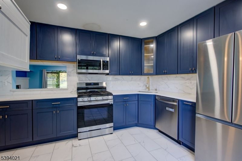 Interior, Kitchen, Marble, Marble Walls, Recessed Lighting, Stainless Steel Appliances