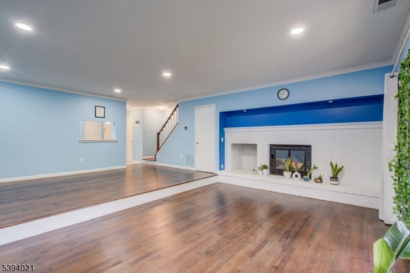 Empty room, Fireplace, Interior, Recessed Lighting, Wood Texture Flooring