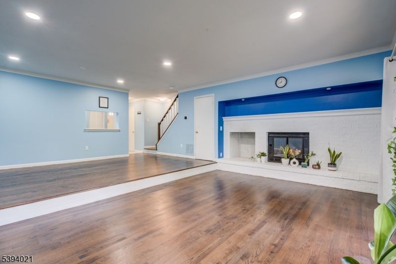 Empty room, Fireplace, Interior, Recessed Lighting, Wood Texture Flooring