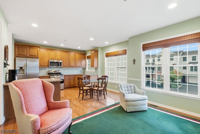 Dining room, Interior, Kitchen, Recessed Lighting, Stainless Steel Appliances, Wood Texture Flooring