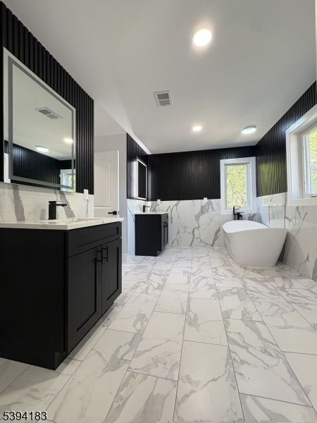 Bathroom, Dual Sink Vanities, Free Standing Baths, Interior, Marble, Marble Walls, Recessed Lighting