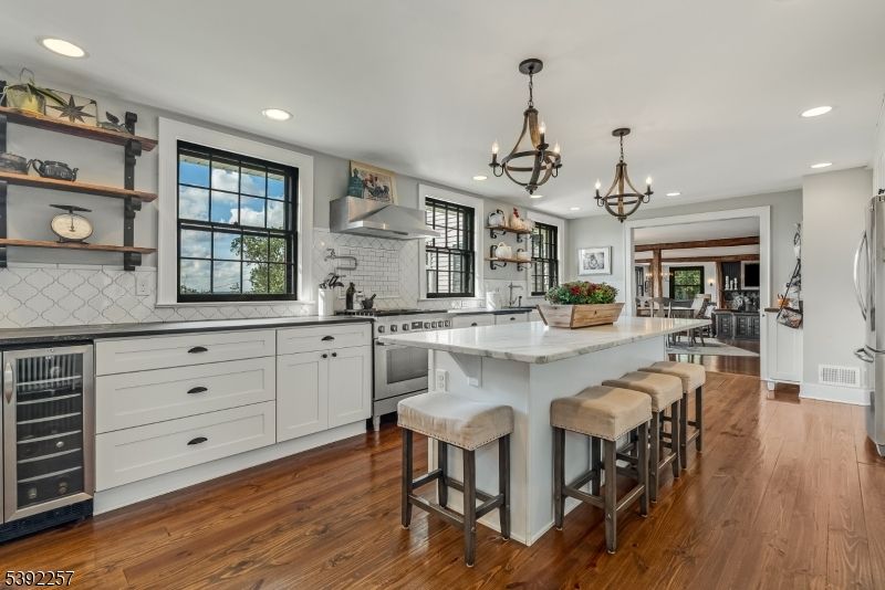 Chandelier, Interior, Kitchen, Recessed Lighting, Stainless Steel Appliances, Wood Texture Flooring