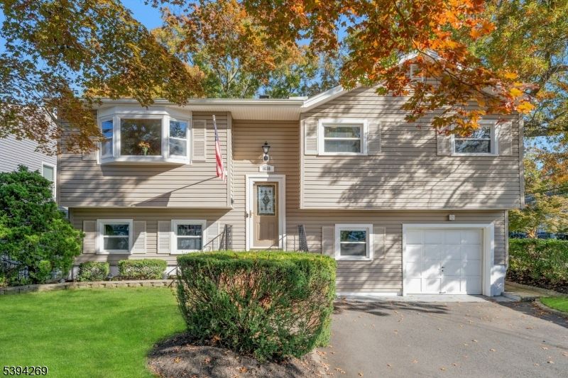 Attached, Exterior, Facade, Raised Ranch