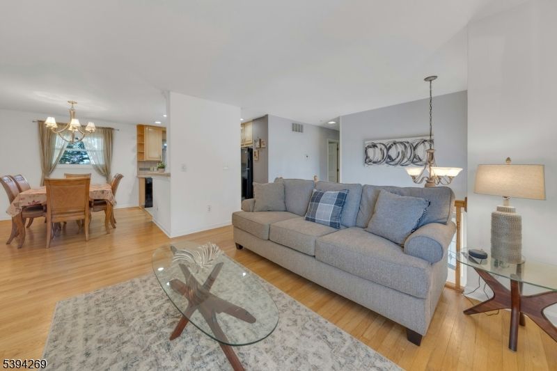 Chandelier, Dining room, Interior, Kitchen, Living room, Recessed Lighting, Wood Texture Flooring