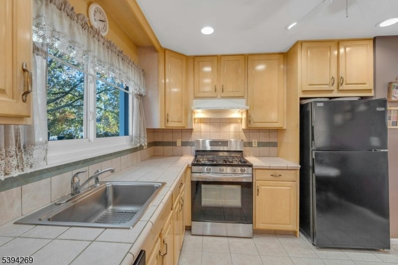 Interior, Kitchen, Recessed Lighting, Tile Countertops