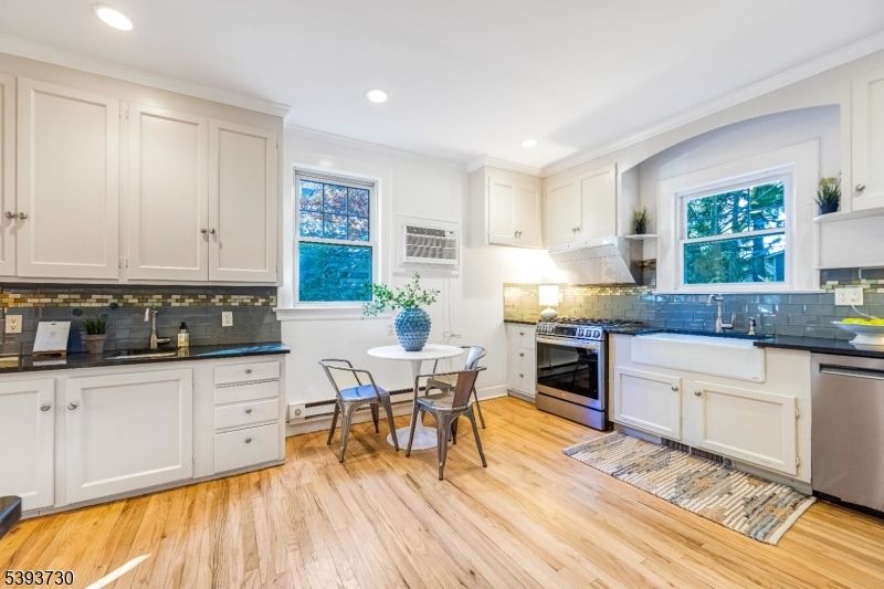 Dining room, Interior, Kitchen, Recessed Lighting, Stainless Steel Appliances, Wood Texture Flooring