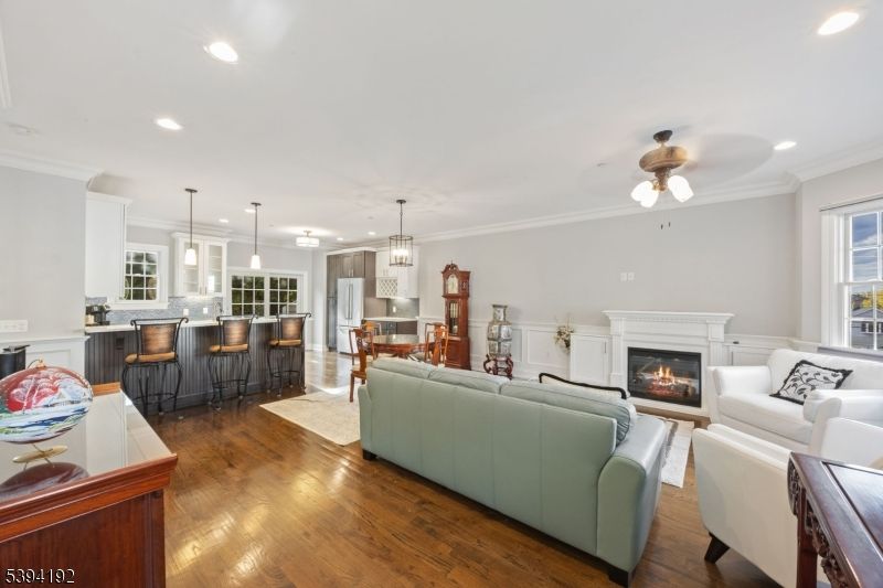 Dining room, Fireplace, Interior, Kitchen, Living room, Pendant Lights, Recessed Lighting, Wood Texture Flooring
