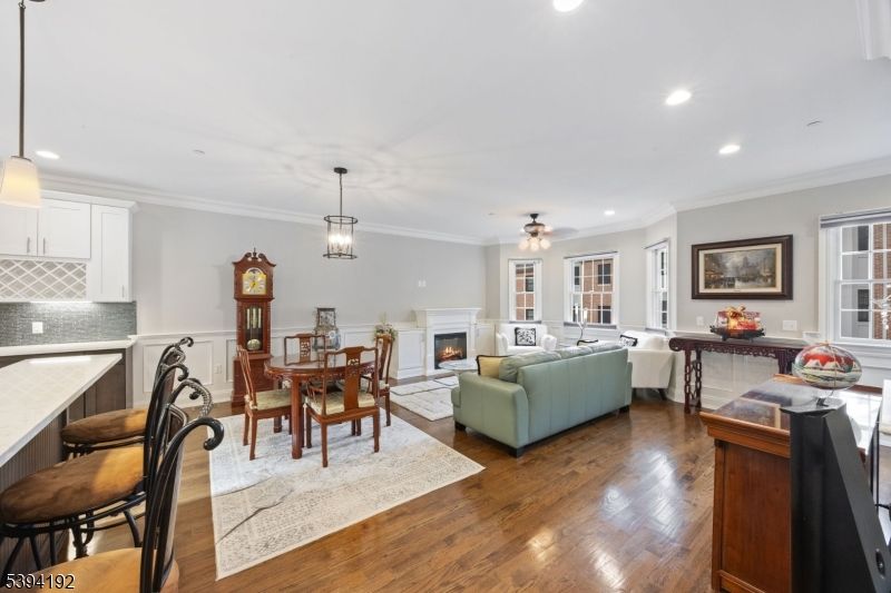 Dining room, Fireplace, Interior, Kitchen, Living room, Pendant Lights, Recessed Lighting, Wood Texture Flooring