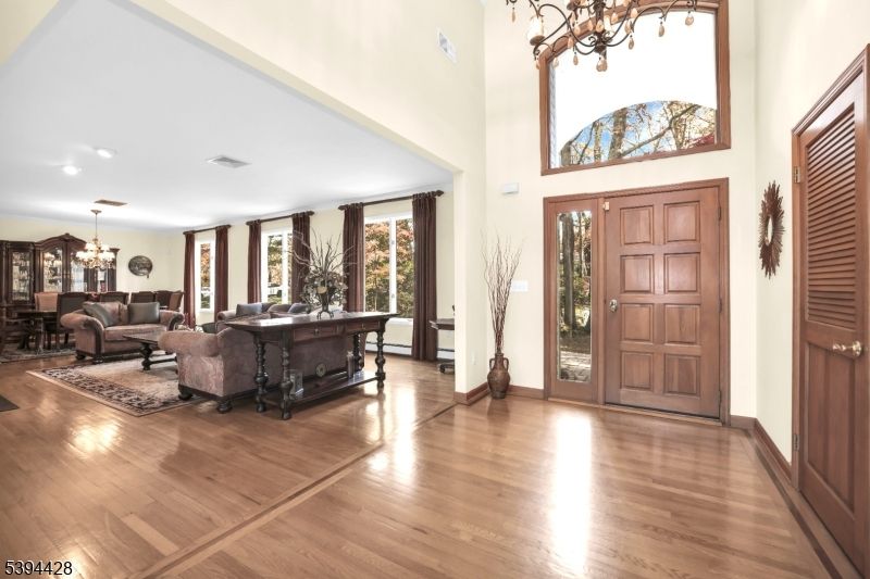Chandelier, Dining room, Interior, Living room, Recessed Lighting, Wood Texture Flooring
