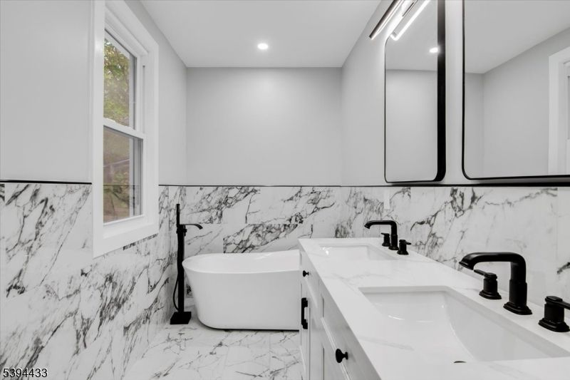 Bathroom, Dual Sink Vanities, Free Standing Baths, Interior, Marble, Marble Walls, Recessed Lighting