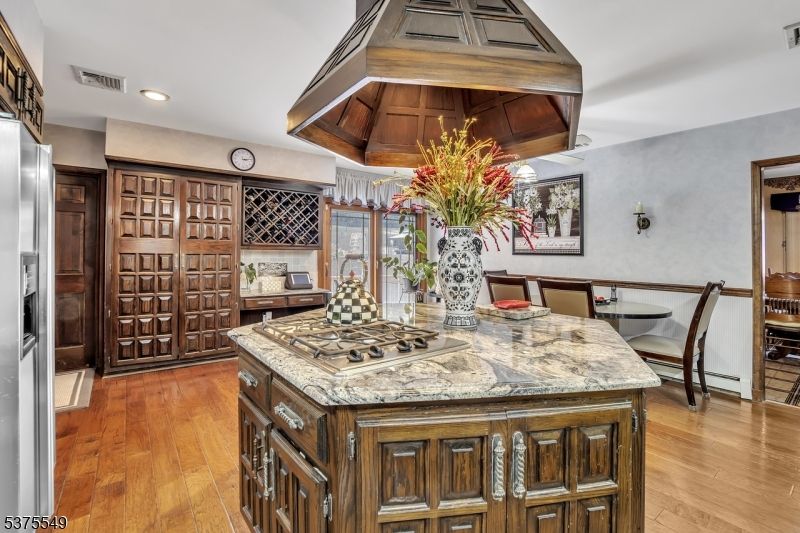 Dining room, Interior, Kitchen, Recessed Lighting, Stainless Steel Appliances, Wood Texture Flooring