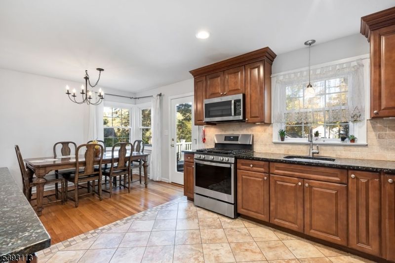 Chandelier, Dining room, Interior, Kitchen, Pendant Lights, Recessed Lighting, Wood Texture Flooring
