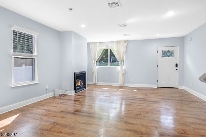 Empty room, Fireplace, Interior, Recessed Lighting, Wood Texture Flooring