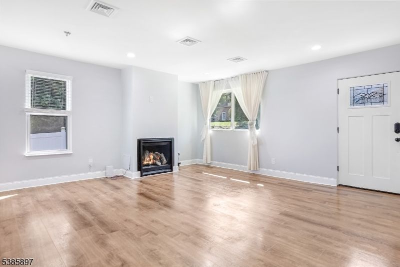 Empty room, Fireplace, Interior, Recessed Lighting, Wood Texture Flooring