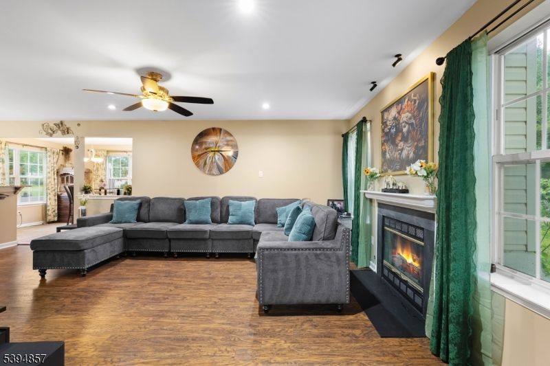 Fireplace, Interior, Living room, Recessed Lighting, Wood Texture Flooring