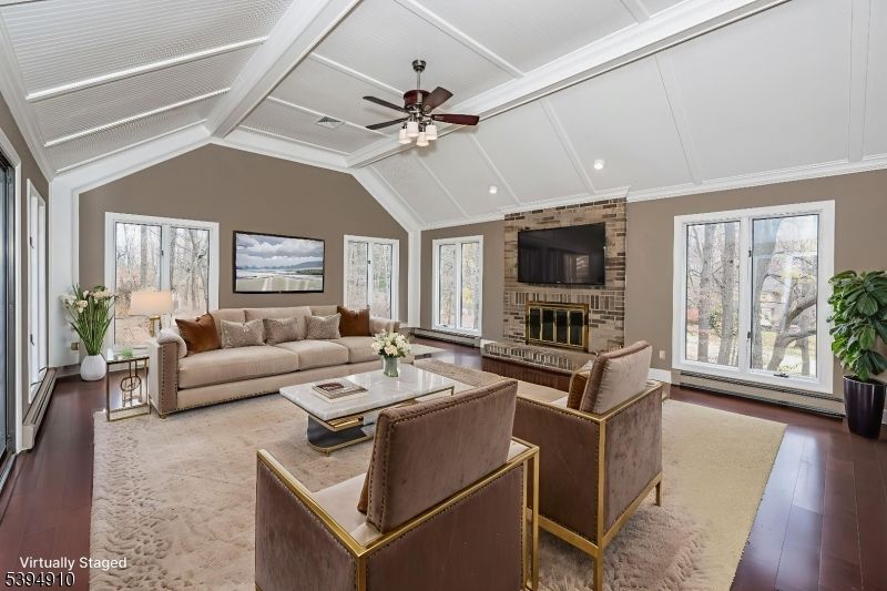 Fireplace, Interior, Living room, Recessed Lighting, Stone Walls, Wood Texture Flooring