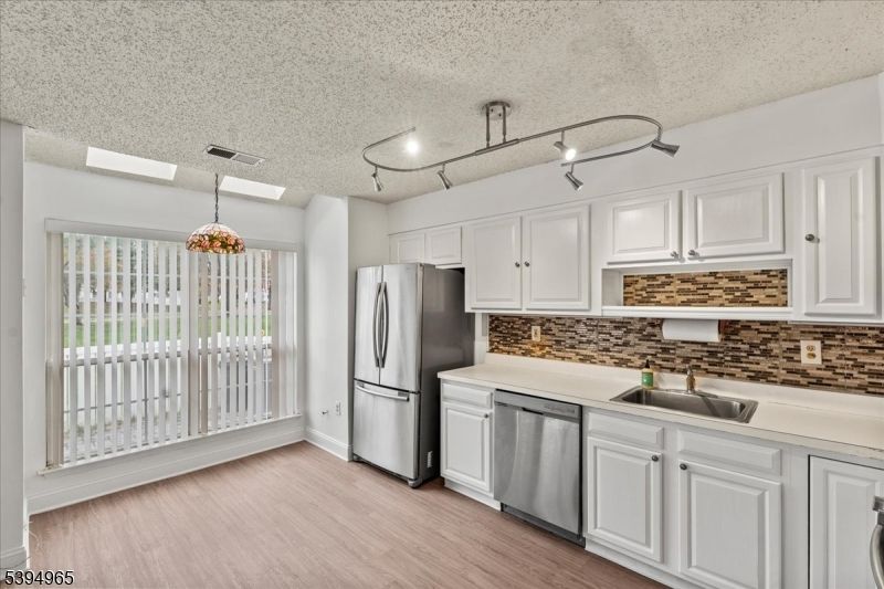 Interior, Kitchen, Pendant Lights, Stainless Steel Appliances, Wood Texture Flooring