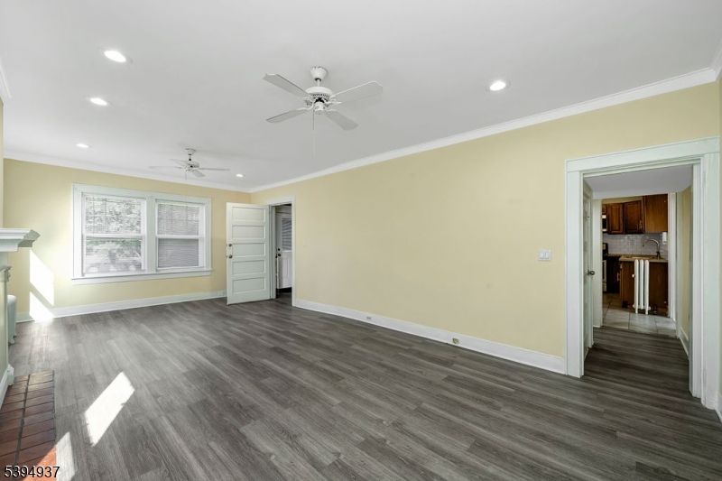 Empty room, Fireplace, Interior, Recessed Lighting, Wood Texture Flooring